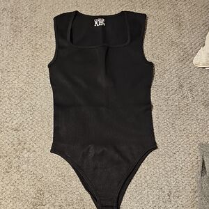 Elegant Black Ribbed Bodysuit